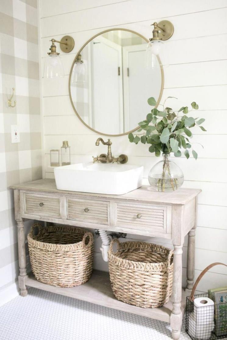 Mobile portalavabo in legno con sotto ceste portabiancheria