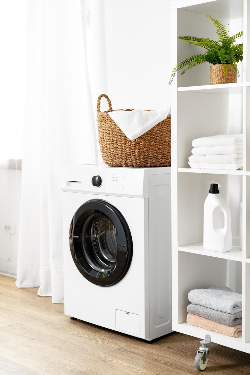Zona lavanderia in bagno 