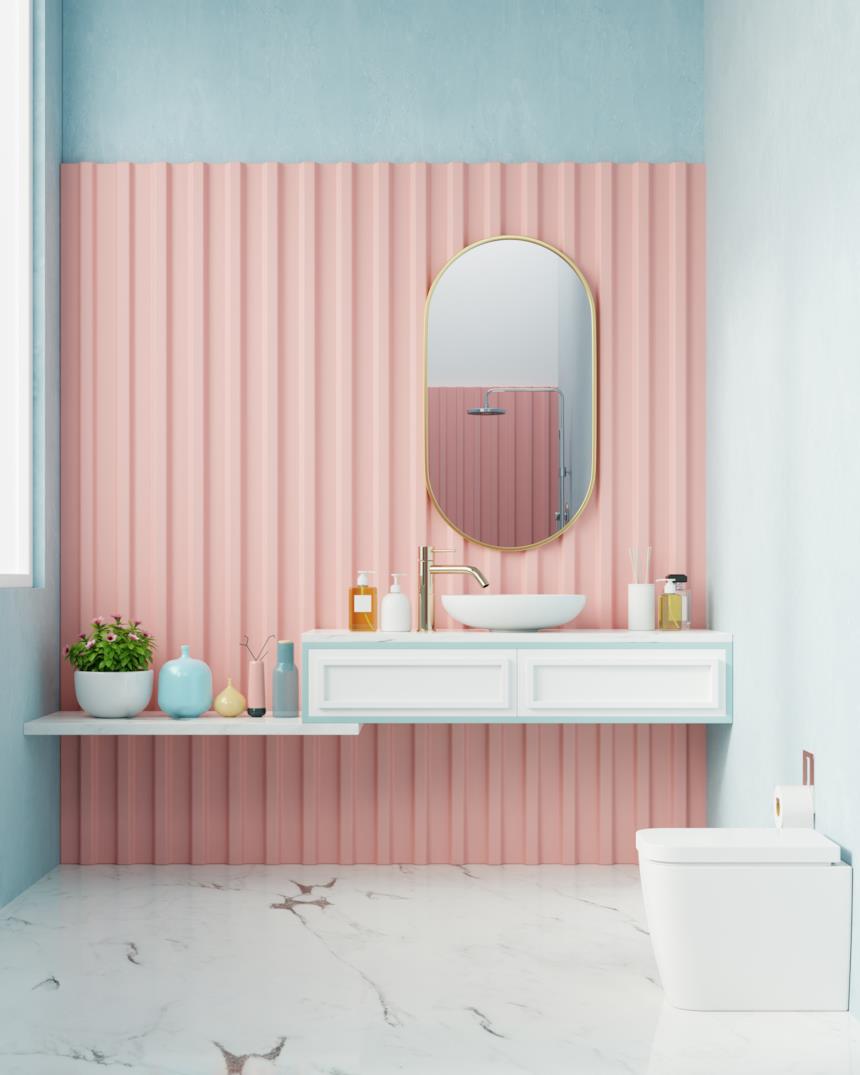 Delizioso bagno con parete rosa e sanitari bianchi