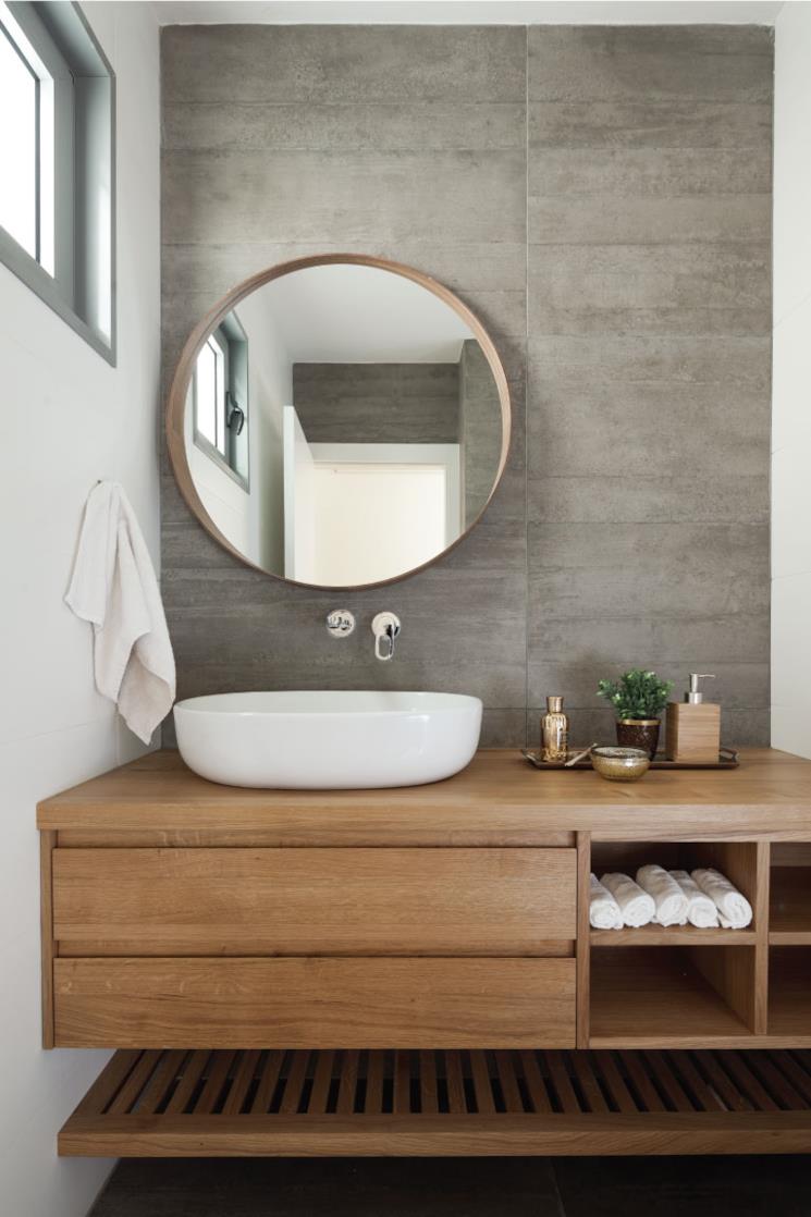 Lavabo da appoggio su mobile in legno