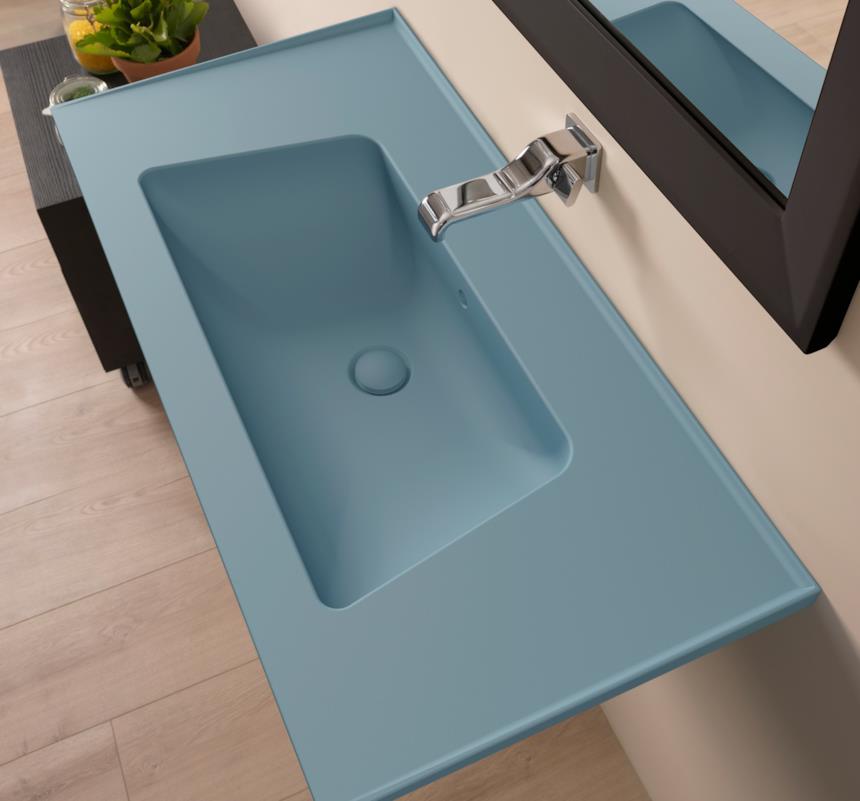 Lavabo di forma gemetrica color petrolio 