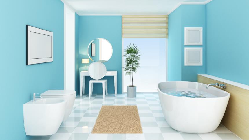 Bagno con pareti azzurre e sanitari bianchi 