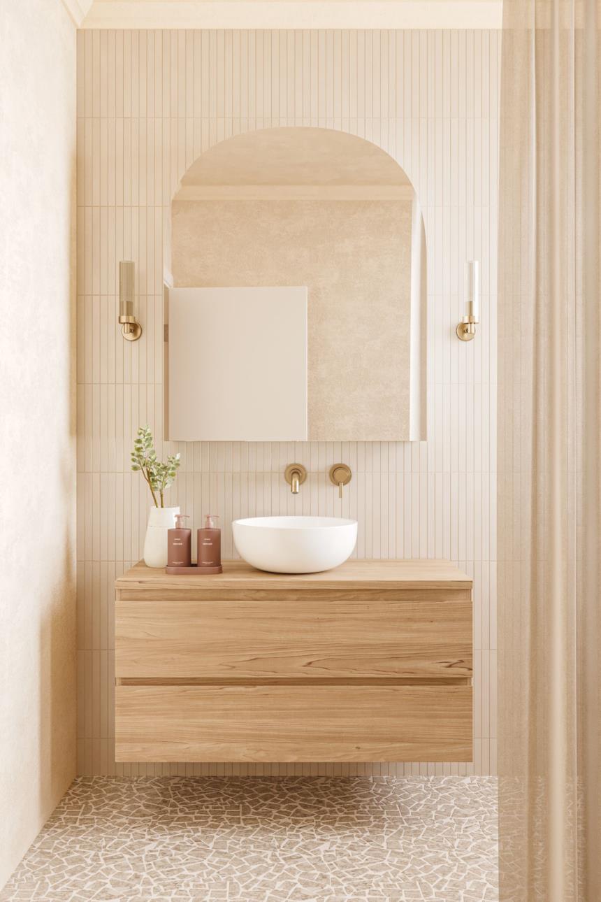 Bagno beige con mobili in legno