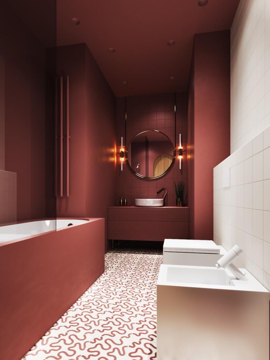 Foto di un bagno con pareti tinte di rosso