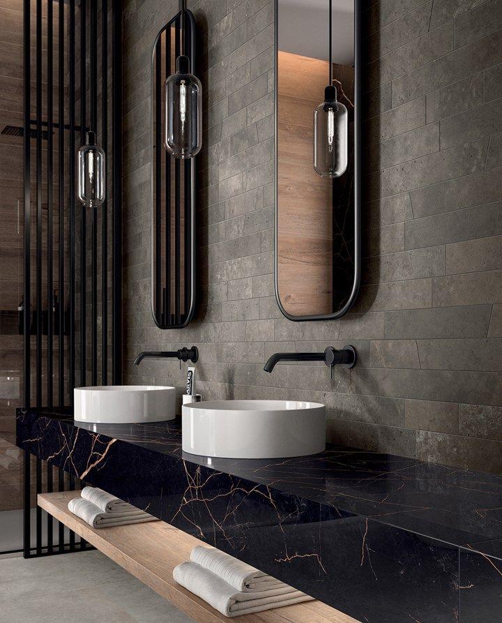 Bagno nero con lavabi in ceramica bianca