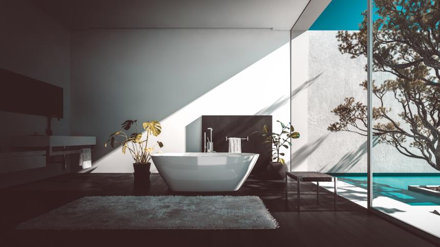 Bagno con vasca freestanding e tappeto grande 