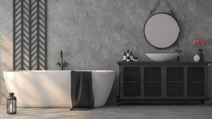 Bagno grigio con mobili neri 