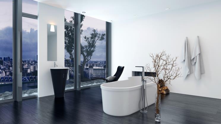 Bagno con vasca freestanding e pavimento in parquet scuro 