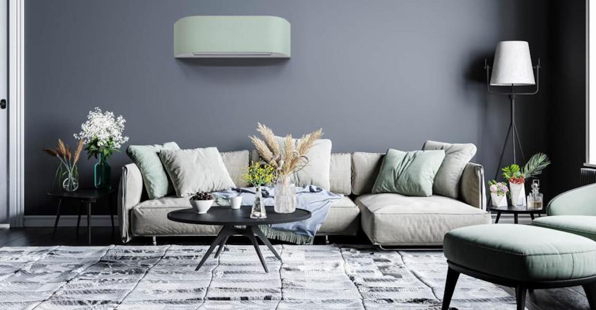 Salotto con climatizzatore Toshiba Haori rivestito in elegante tessuto verde acqua 