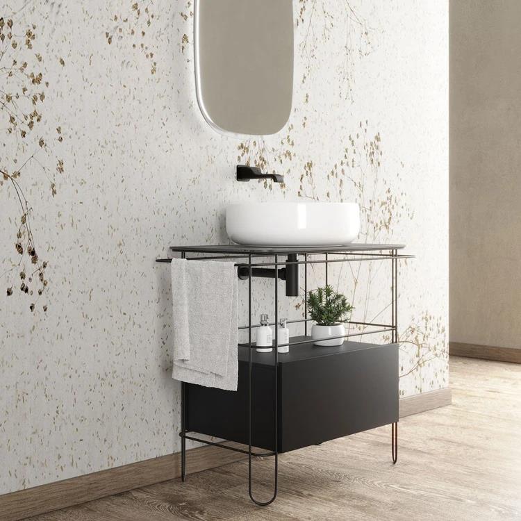 Struttura in acciaio inox, con top in vetro e cassetto per lavabo da appoggio