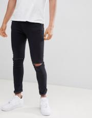 Jeans skinny con strappi alle ginocchia