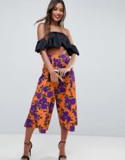 Pantaloni cropped arancioni e viola, modello palazzo a fiori 