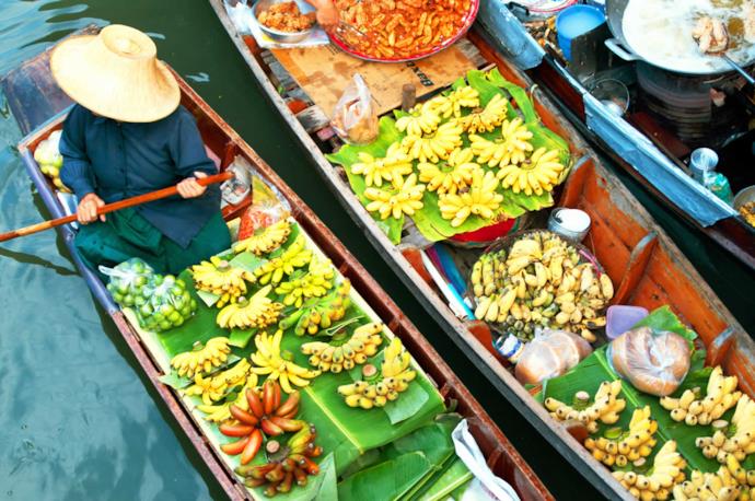 Thai people selling produce at a floating market
