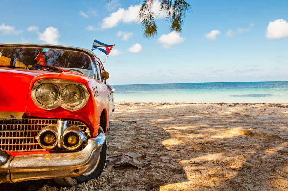 Old car on a beach in Cuba