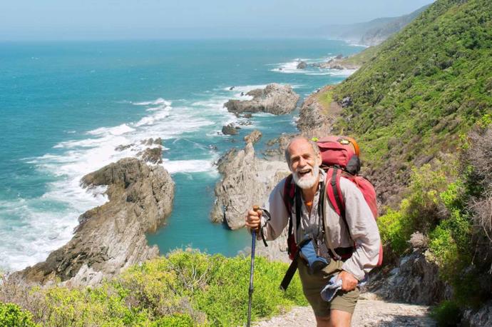 Old man backpacking in South Africa.