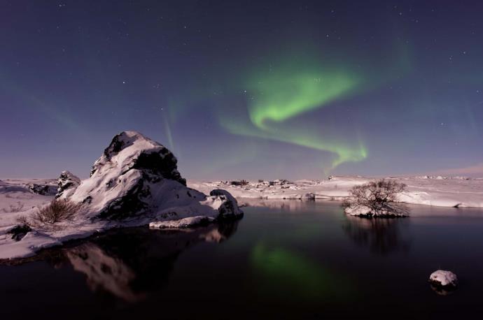 Northern lights on mountains in Iceland