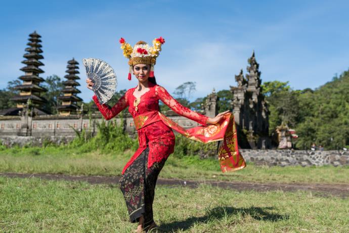 Woman dancing Barong dance in Bali