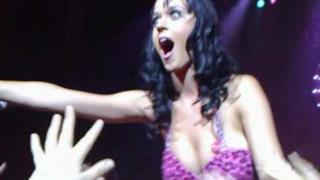 Katy Perry kisses a girl in the crowd at her Concert